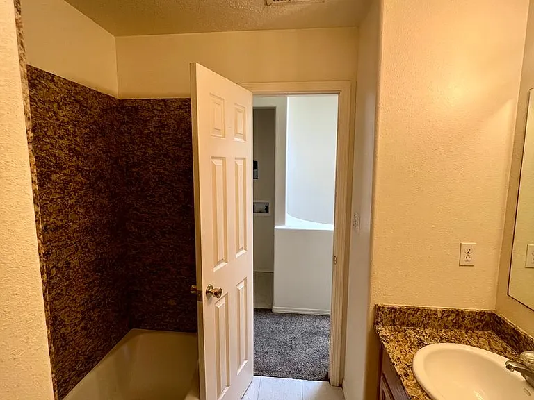 Modern Condo-Style Living Near Nob Hill & UNM $300 Off Move-In Special at The Spirals Apartments — Photo 49