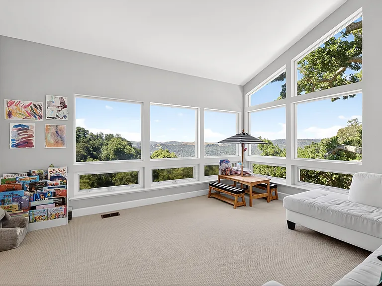 Family room we use as a play room. View: downtown Lafayette