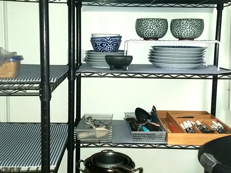 storage closet with all kitchen needs