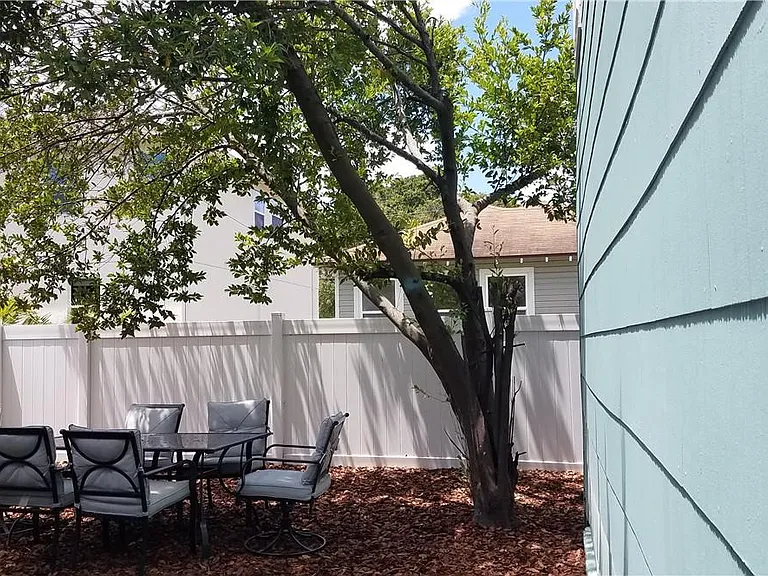 Several custom homes surround this rental property.