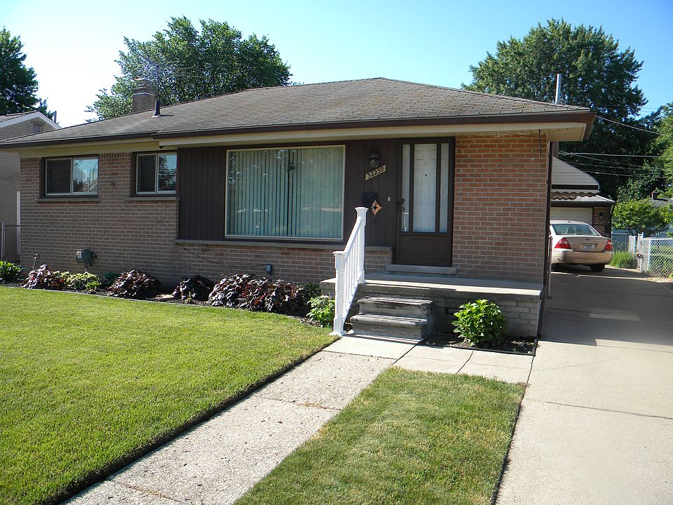 House front w/ 2 car garage.