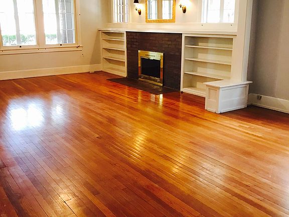 Fireplace with original built-in shelves