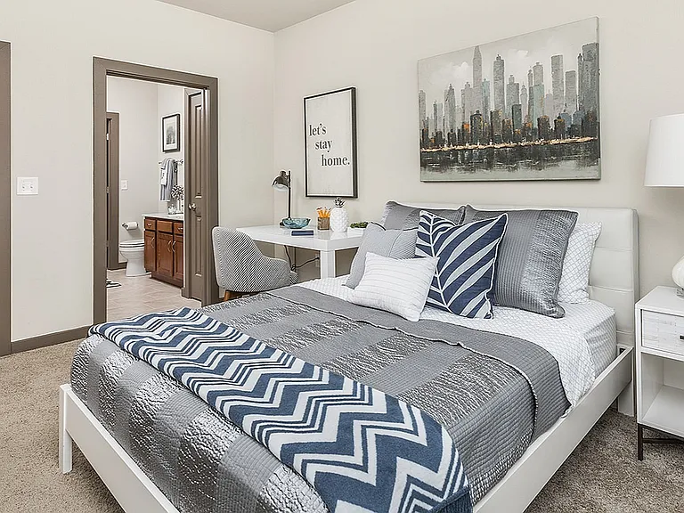 Room to sleep, stretch, and still have space for your WFH setup. This bedroom brings modern vibes with a private bathroom just steps away.