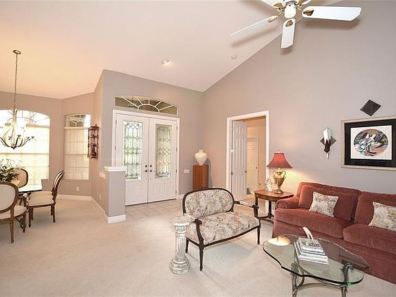 Double glass door entry to the light and bright living area.