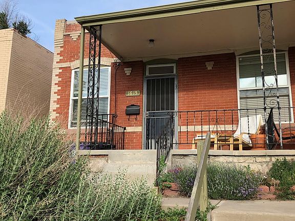 An elevated front patio away from the sidewalk.