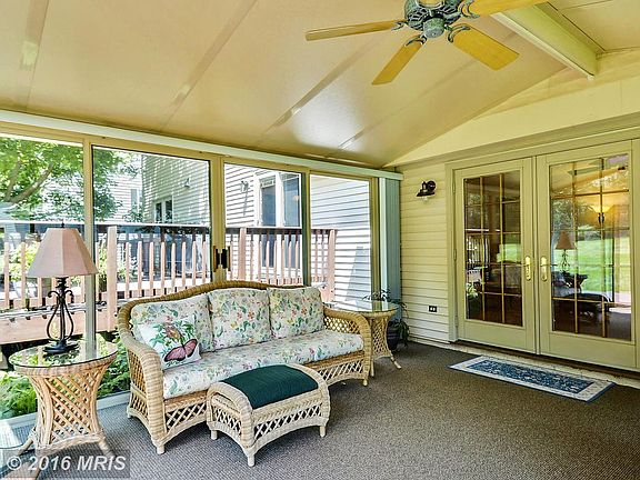 Vaulted Sunroom with Screens and Privacy Blinds