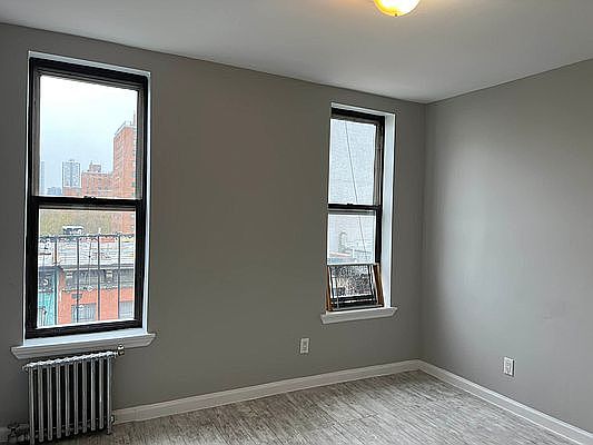 5th image of 238 E 111th St APT 6D