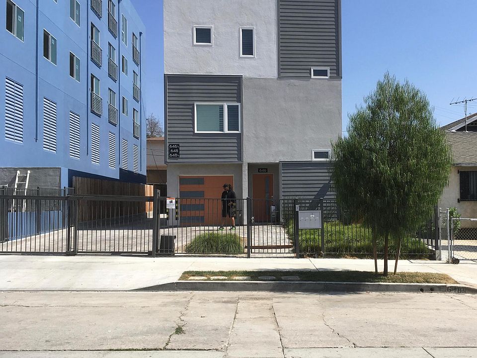 FRONT UNIT HAS 3 CAR PARKING - 2 CAR GARAGE AND ONE CARPORT PARKING OR PATIO AREA