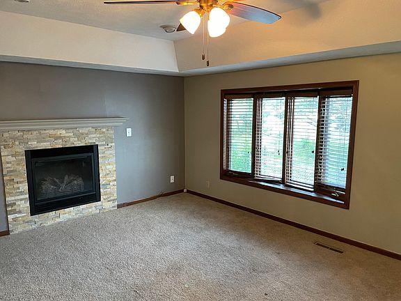 Large family room with bay window & gas fireplace