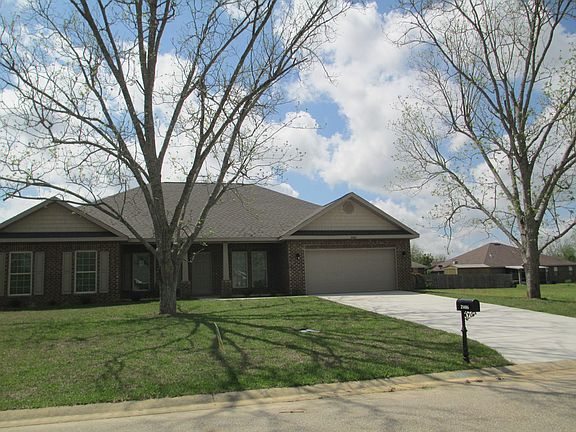 2 pecan trees in front
