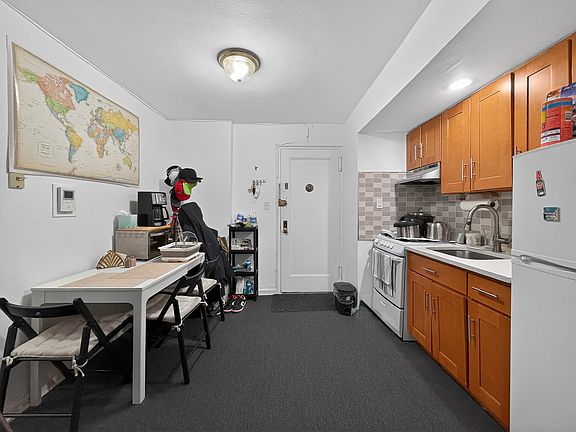 5th image of 105-24 63rd Dr APT 4L