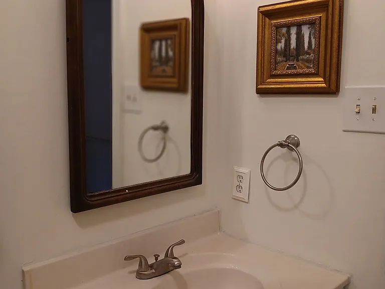 There are two full baths and one half bath.