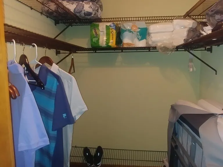 Master bed walk in closet