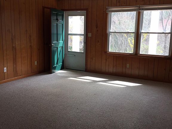 Large open living room to kitchen living space - Lots of Light with views and lawn in front!