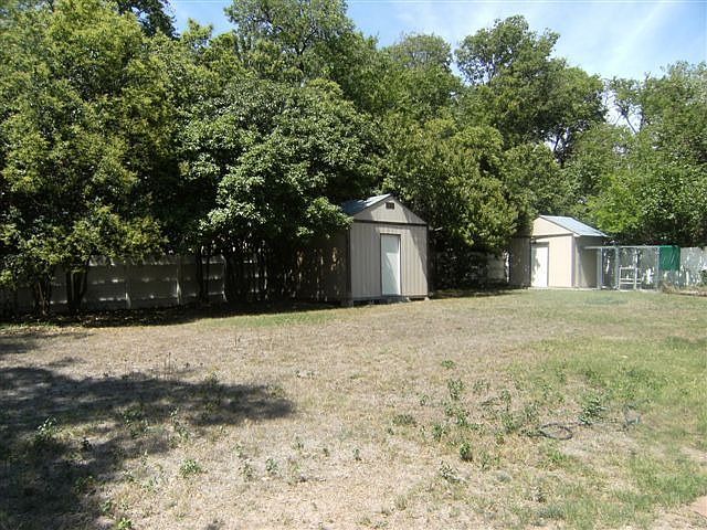 back yard w storage sheds
