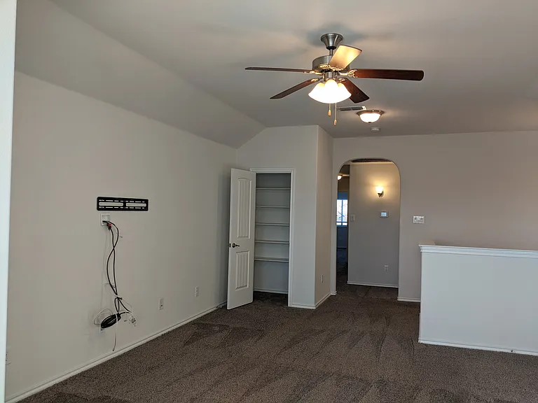 upstairs living area has closet for storage