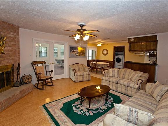 Cozy Den features wood laminate flooring