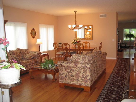 Open floor plan with hardwood floors