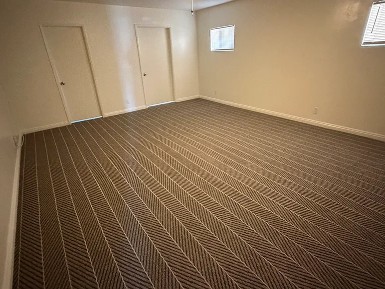 The primarybedrooms featuresdan additionall wall-mounted A/Cc unit to control the temperature as it is a very large room. Primary bedroom has a walk in closet and private bathroom.