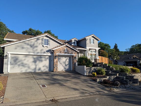 Exterior left, three car garage