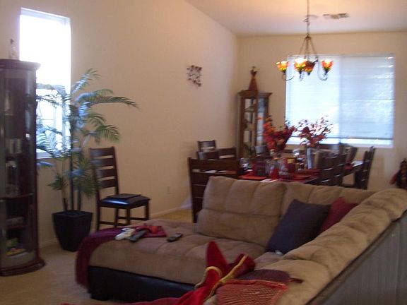 Living room/dining room with light fixture