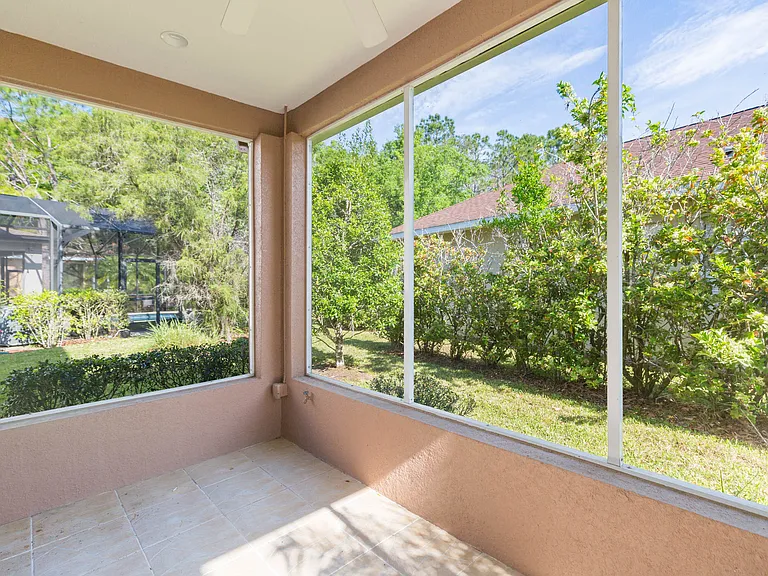 Outdoor lanai- screened in with water and power ready !