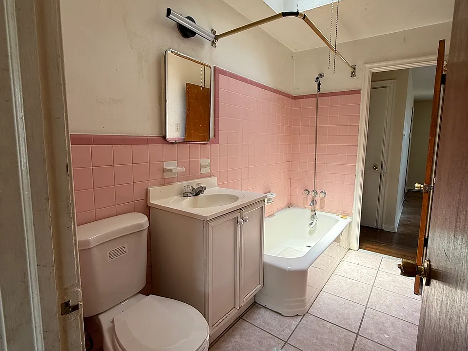 Bathroom
- skylight
- new bathroom sink and cabinet
- new vanity cabinet and mirror
- freshly caulked full-size bathtub