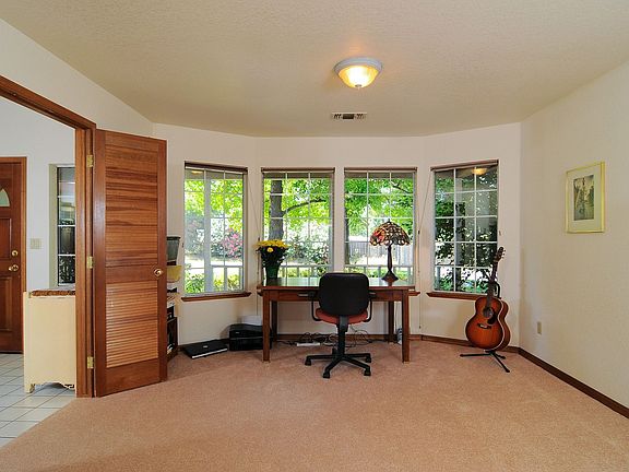 Formal dining room currently being used as a office.