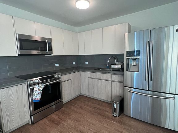 Kitchen with spacious fridge