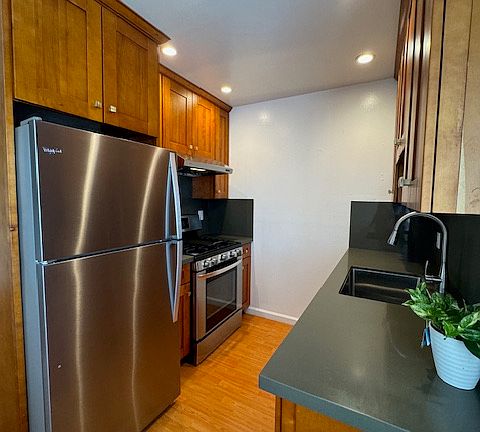 quartz counters and bright kitchen