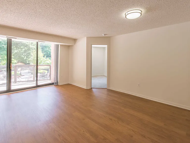 Living Room with Hard Surface Flooring and Private Balcony