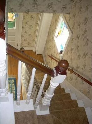 Staircase and Stained Glass Window