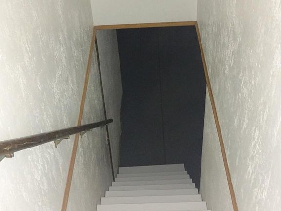 Staircase going to basement.