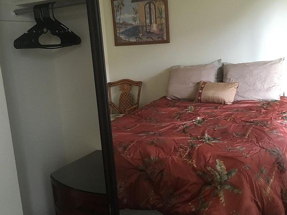 Mirrored wardrobe doors and shelves in one of the queen bedrooms plus pantry shelves in closet and bathroom w/tub