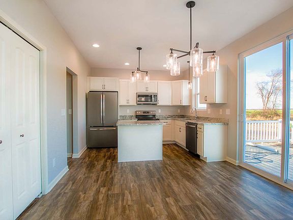 Floor plans and photos shown may include base features along with additional options and upgrades.