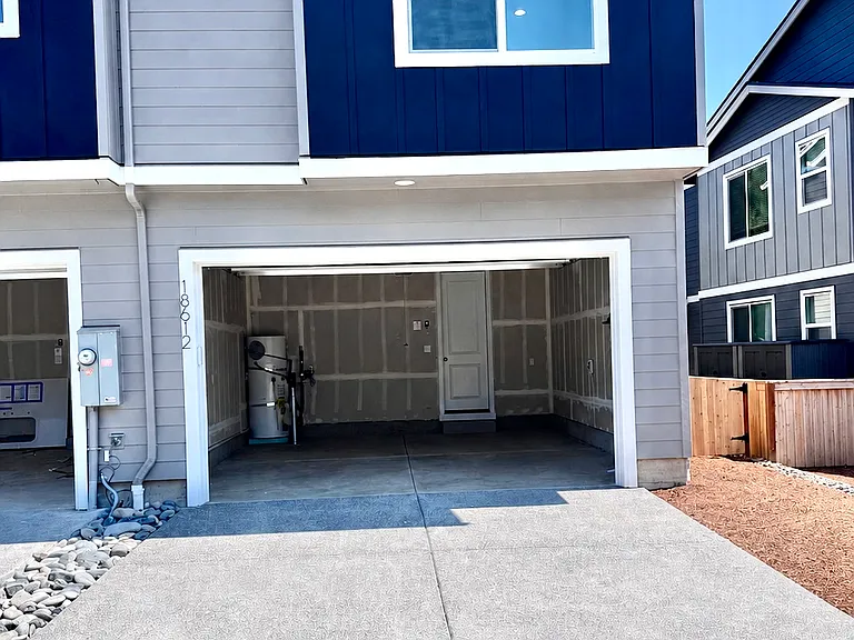 2 car attached garage w/ driveway