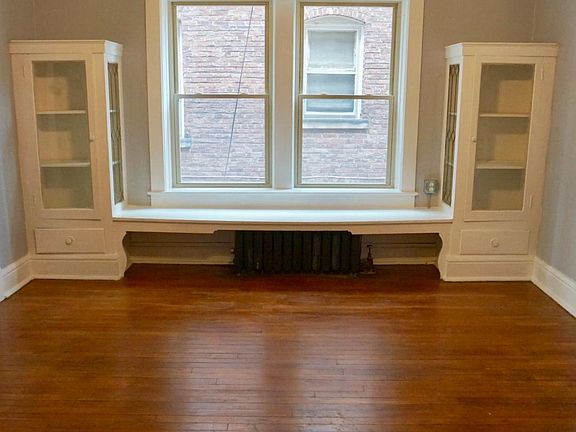 Dining room with built in cabinets