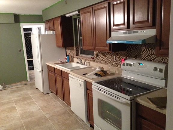 New tile, cabinets, counter