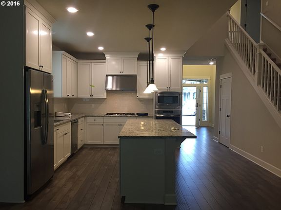 2nd image of 6695 SW Locust St Lot 12