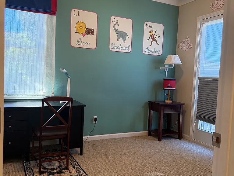bedroom #3. Has small balcony to outside.