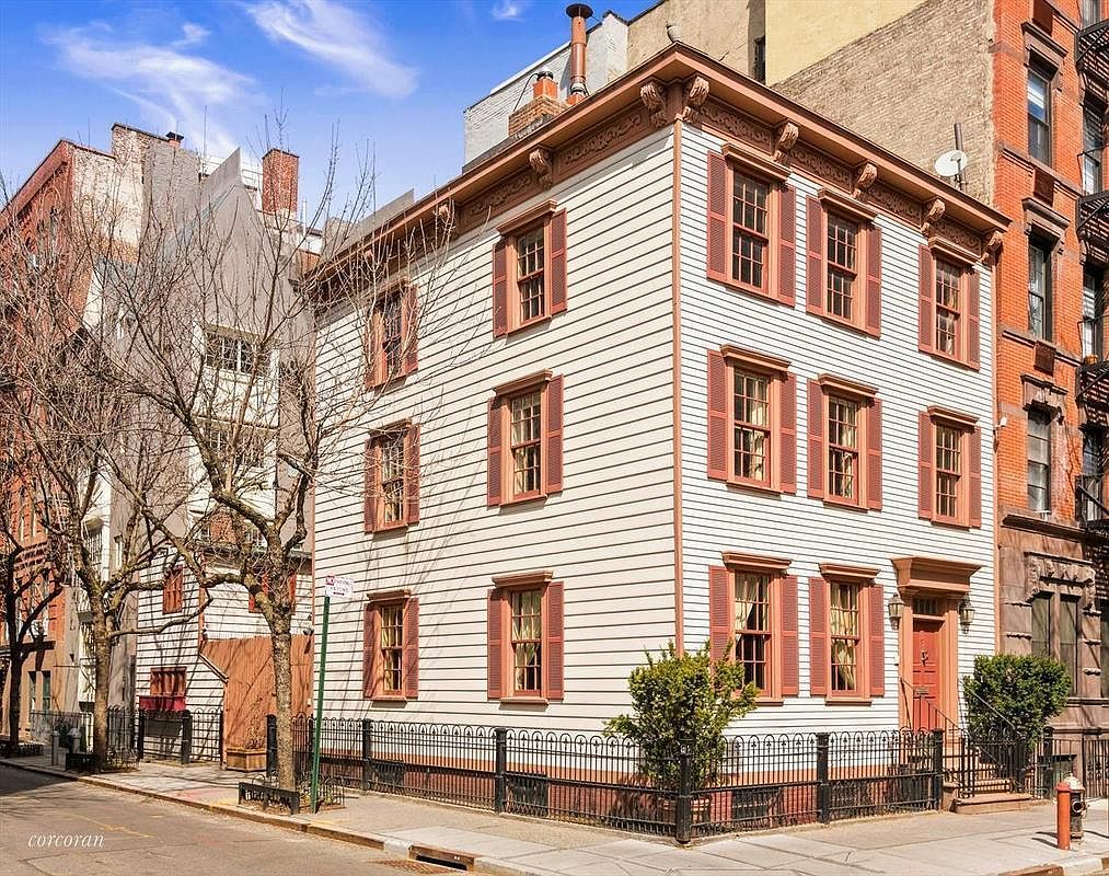 The friends apartment building is on the corner of the Bedford and Grove  streets in Greenwich village