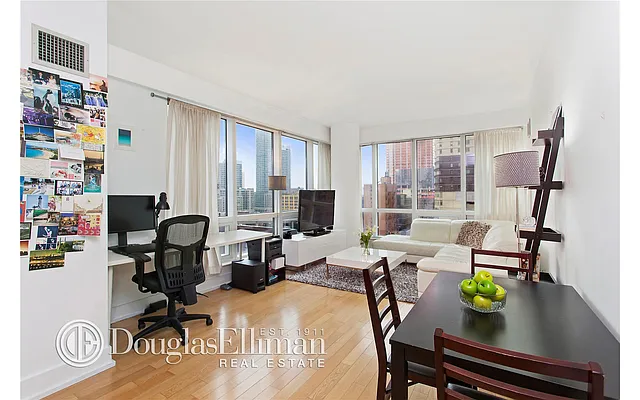 Sold by Douglas Elliman | media 13