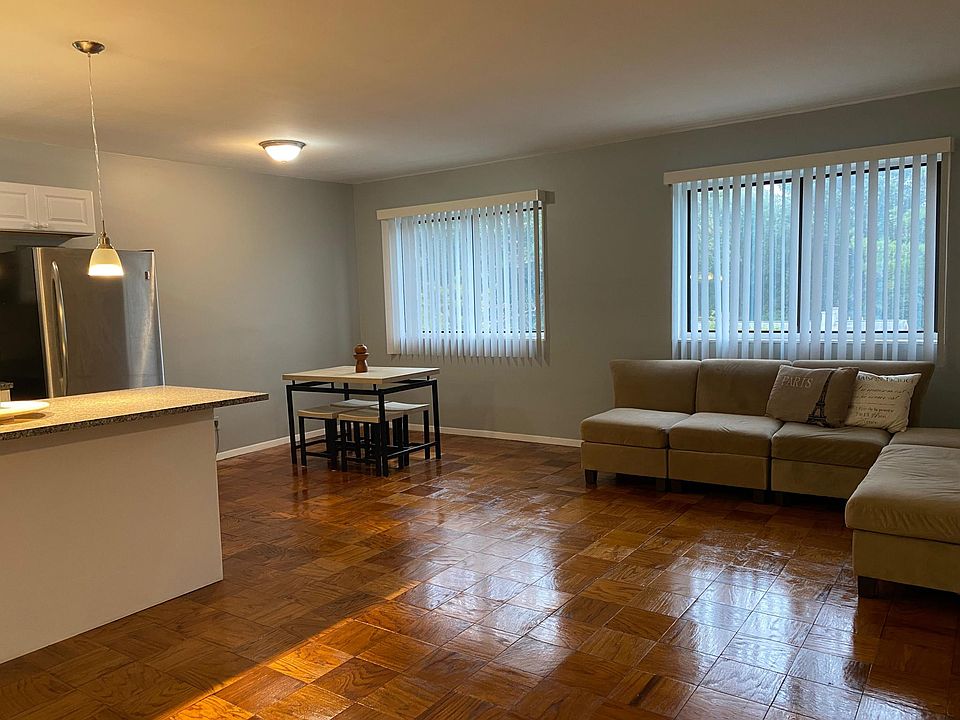 Kitchen with granite island and plenty of cabinets open living/dining/kitchen
