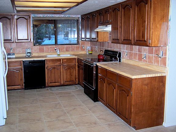 Kitchen complete with dishes, spices, etc.