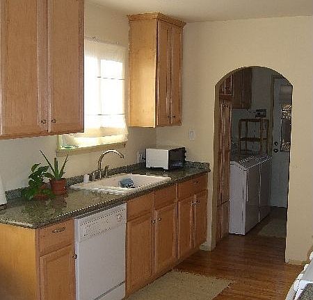 Newly remodeled kitchen w/ room for a breakfast table. Laundry just off kitchen.
