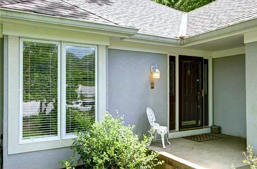 STUCCO EXTERIOR, COVERED ENTRY