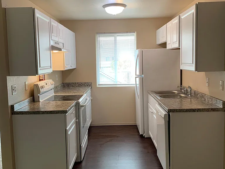 Finished new kitchen. New Cabinets, countertops, sink, dishwasher and flooring. With self cleaning oven/glass top stop.