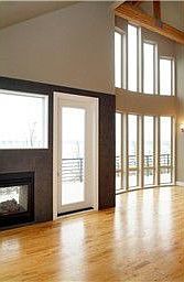 Front of condo building. Garages are below lower unit. Top floor unit has it's own private elevator.