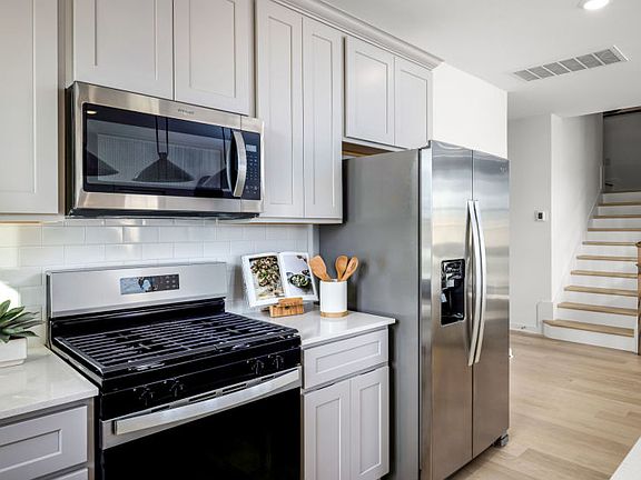 Kitchen Leading to Stairway