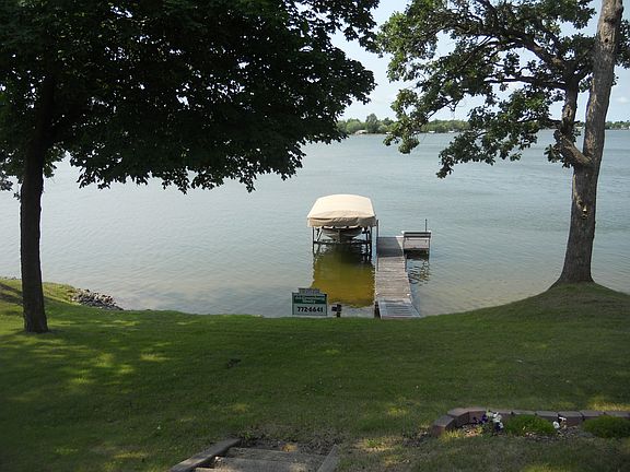 Includes boat lift and dock